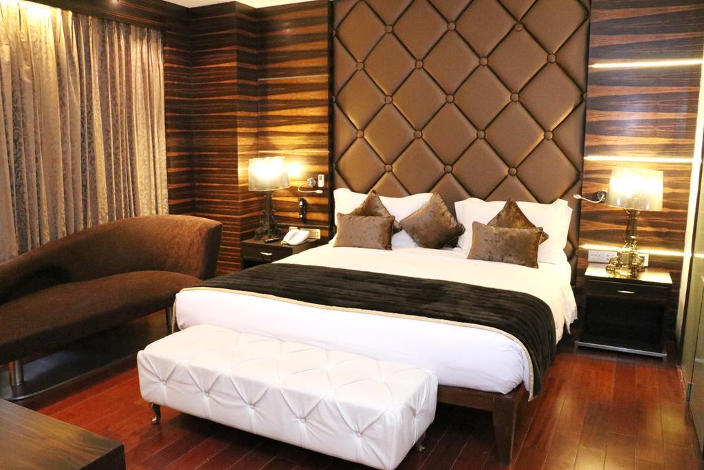 홀리데이 인 찬디가르 판치쿨라 호텔 판체쿠라 외부 사진 A bedroom at the Taj Bengal